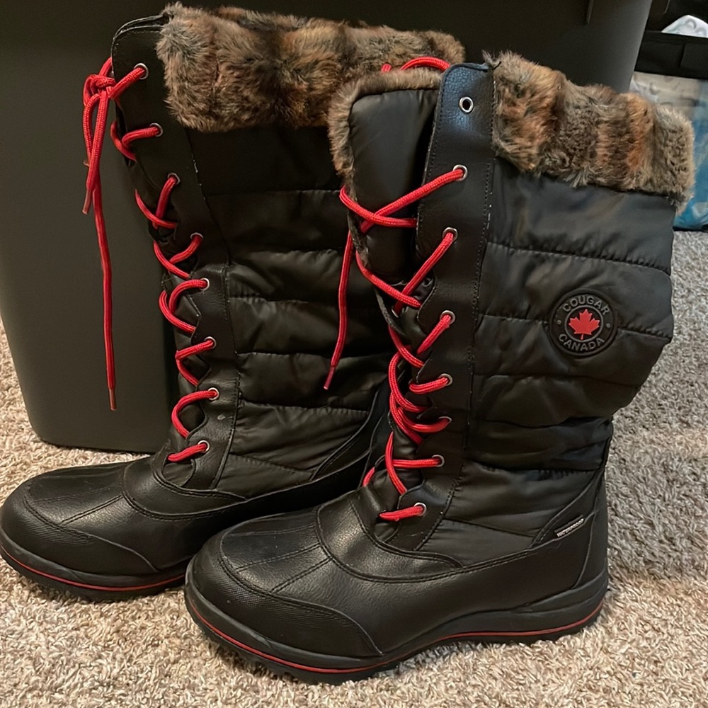 Size 11 boots.  Cougar Waterproof Lace Up Tall Shaft Snow Boots Canu